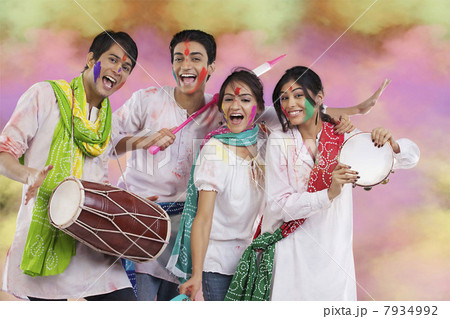 Friends having fun during holi 7934992