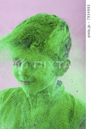 Boy covered with holi colour 7934993