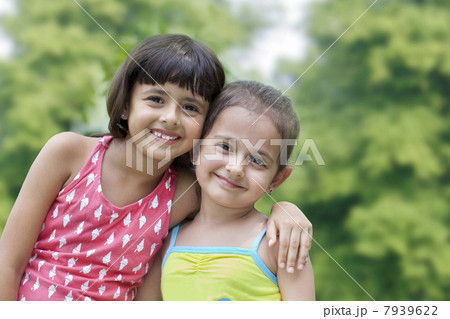 Portrait of cute girls smiling 7939622