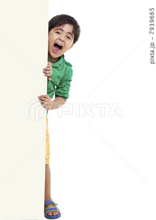 Young boy shouting 7939665