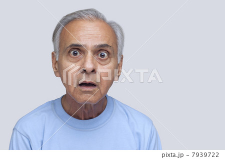 Portrait of surprised senior man 7939722