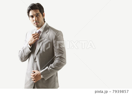 Portrait of handsome businessman over white background 7939857