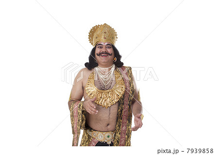 Man dressed as Raavan smiling 7939858