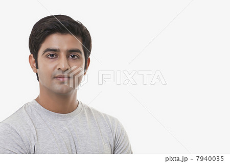 Portrait of handsome young man over white background 7940035