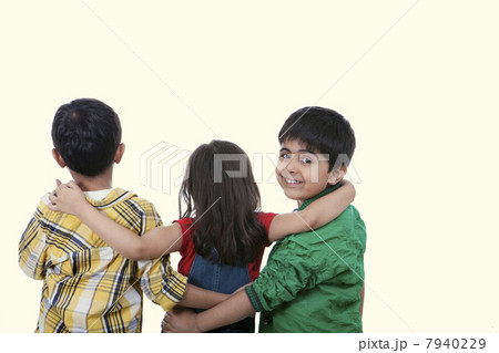 Children standing over colored background Children standing over colored background 7940229