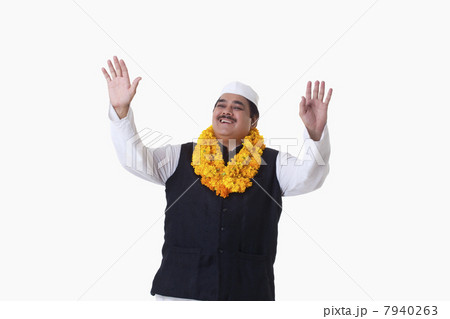 Happy politician with arms raised 7940263