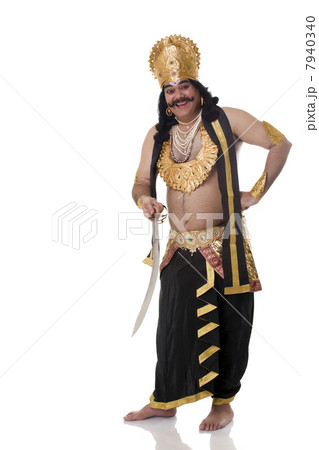 Portrait of a man dressed as Raavan with a sword 7940340