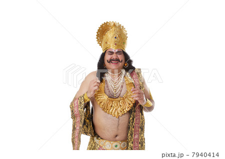 Man dressed as Raavan getting a headache Man dressed as Raavan getting a headache 7940414