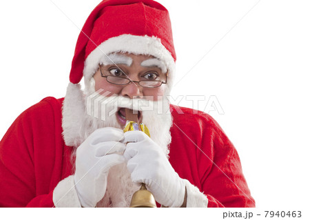 Close-up of Santa Claus eating chocolate bar over white background 7940463