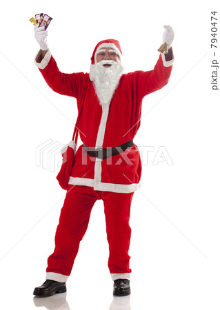 Full length of cheerful Santa Claus with chocolates over white background 7940474