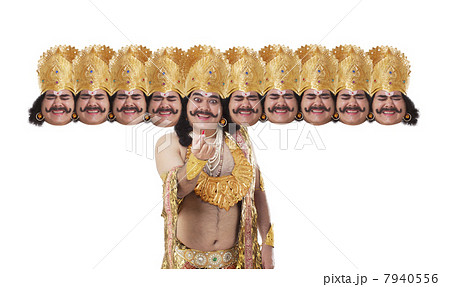 Man dressed as Raavan holding a pill Man dressed as Raavan holding a pill 7940556