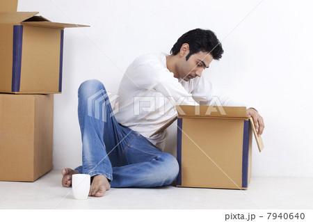 Young man moving into new home 7940640