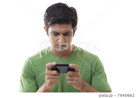 Close-up of smart guy reading text message over white background 7940662
