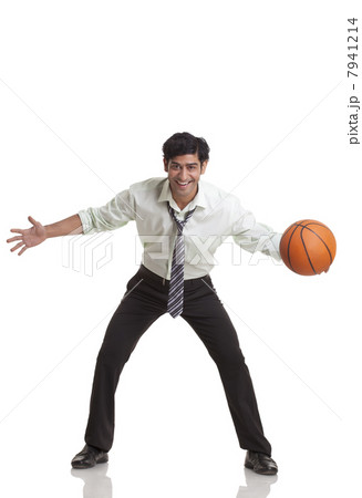 Businessman playing basketball 7941214