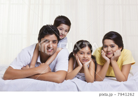 Portrait of family lying in bed Portrait of family lying in bed 7941262