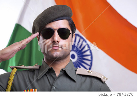 Security guard wearing sunglasses while saluting Indian flag 7941870