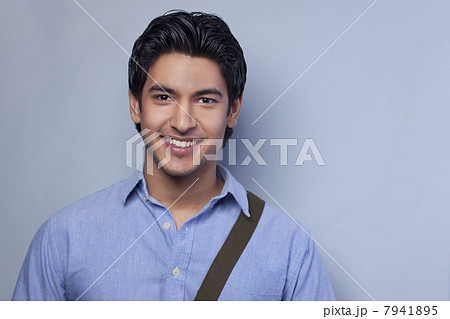 Close-up of young man smiling 7941895