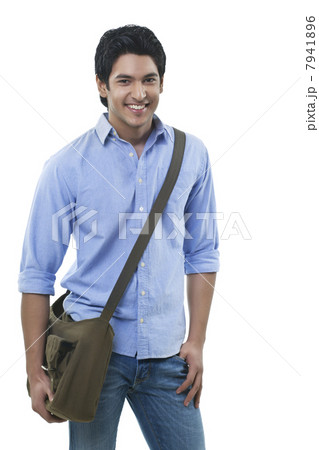 Young handsome man standing over white background Young handsome man standing over white background 7941896
