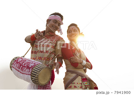 Bihu dancers standing back to back 7941900