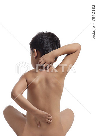 Naked boy scratching his back Naked boy scratching his back 7942182
