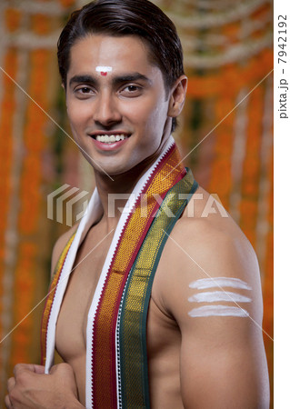 Portrait of handsome groom smiling 7942192