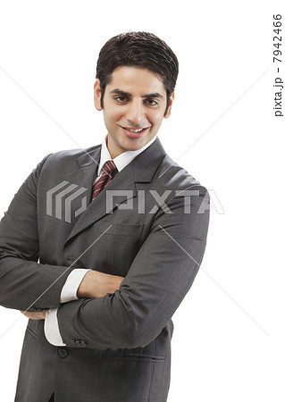 Portrait of well-dressed businessman smiling 7942466