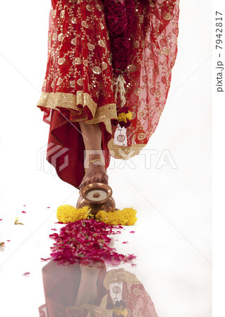 Bride entering the house of the groom 7942817