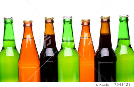 A row of top beer bottles 7943425