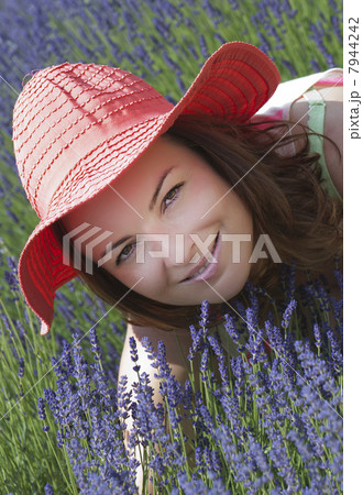 Beautiful woman with hat in a lavender field 7944242