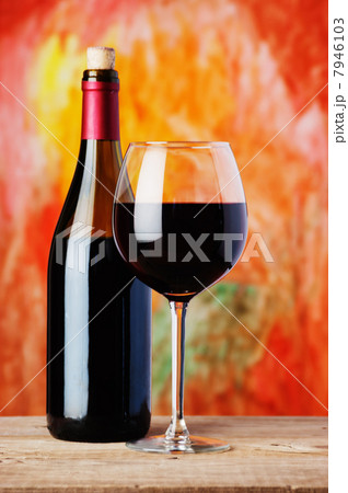 bottle and glass of red wine 7946103