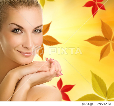 Beautiful young woman over abstract autumn background Beautiful young woman over abstract autumn background 7954218