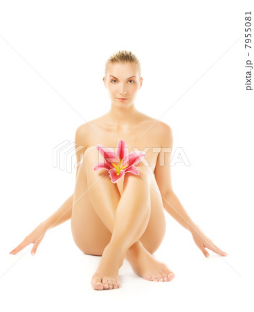 Beautiful young woman with pink lily flower. Isolated on white b 7955081