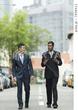 Two of Asian business men outside Two of Asian business men outside 7956411