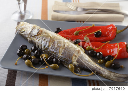 Baked sea bass with vegetables 7957640