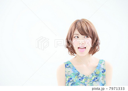 舌を出す女性の写真素材