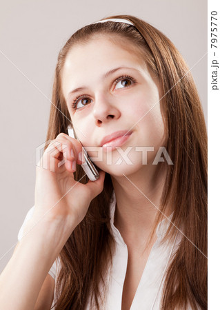 Teenager girl and mobile phone 7975770