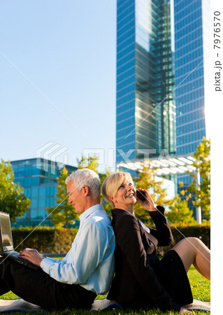 Business people working outdoors 7976570