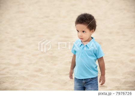 boy on a beach boy on a beach 7976726