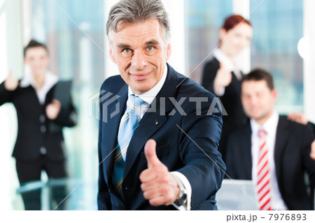 Business - team in an office 7976893
