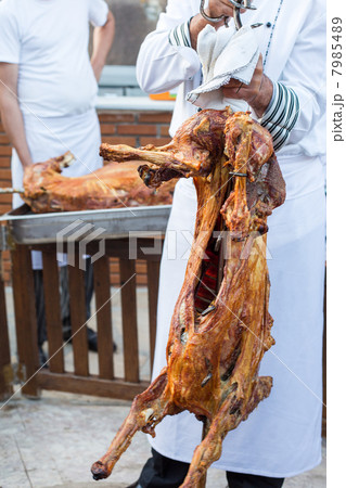 Roasted whole lamb, prepared in earth oven 7985489
