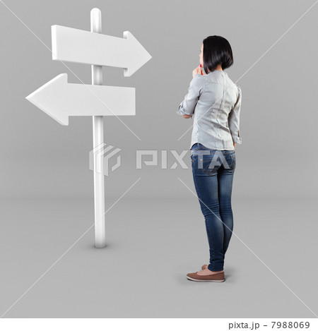Girl before a roadsign Girl before a roadsign 7988069