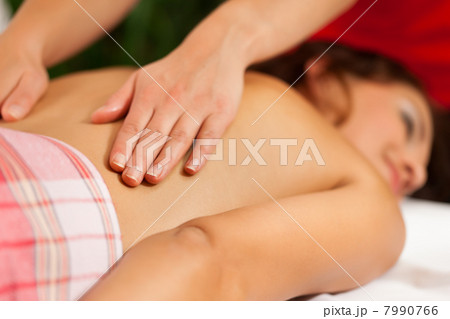 Wellness - woman getting massage in Spa 7990766