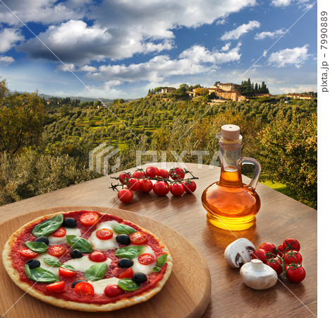 Italian pizza in Chianti, famous vineyard landscape in Italy 7990889