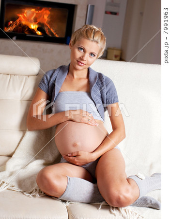 Pregnant woman at home Pregnant woman at home 7991963