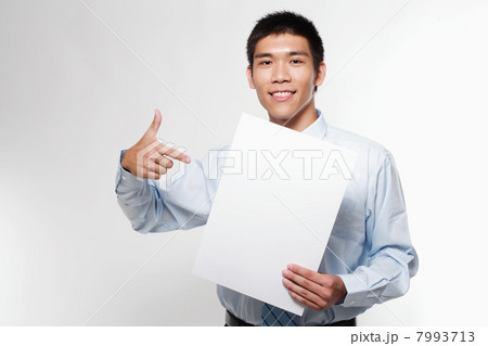 Portrait of a young man with a cardboard in hand 7993713