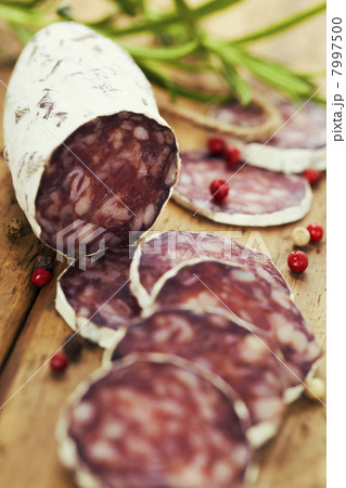 traditional sliced meat sausage salami on wooden board traditional sliced meat sausage salami on wooden board 7997500