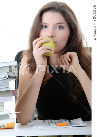 Young and pretty female student with books 8001926
