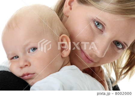 A mother and her tired cute baby boy 8002000