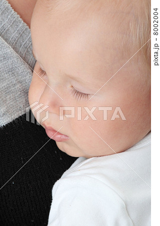 A mother and her tired cute baby boy A mother and her tired cute baby boy 8002004