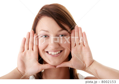 Woman framing her face with her hands Woman framing her face with her hands 8002153